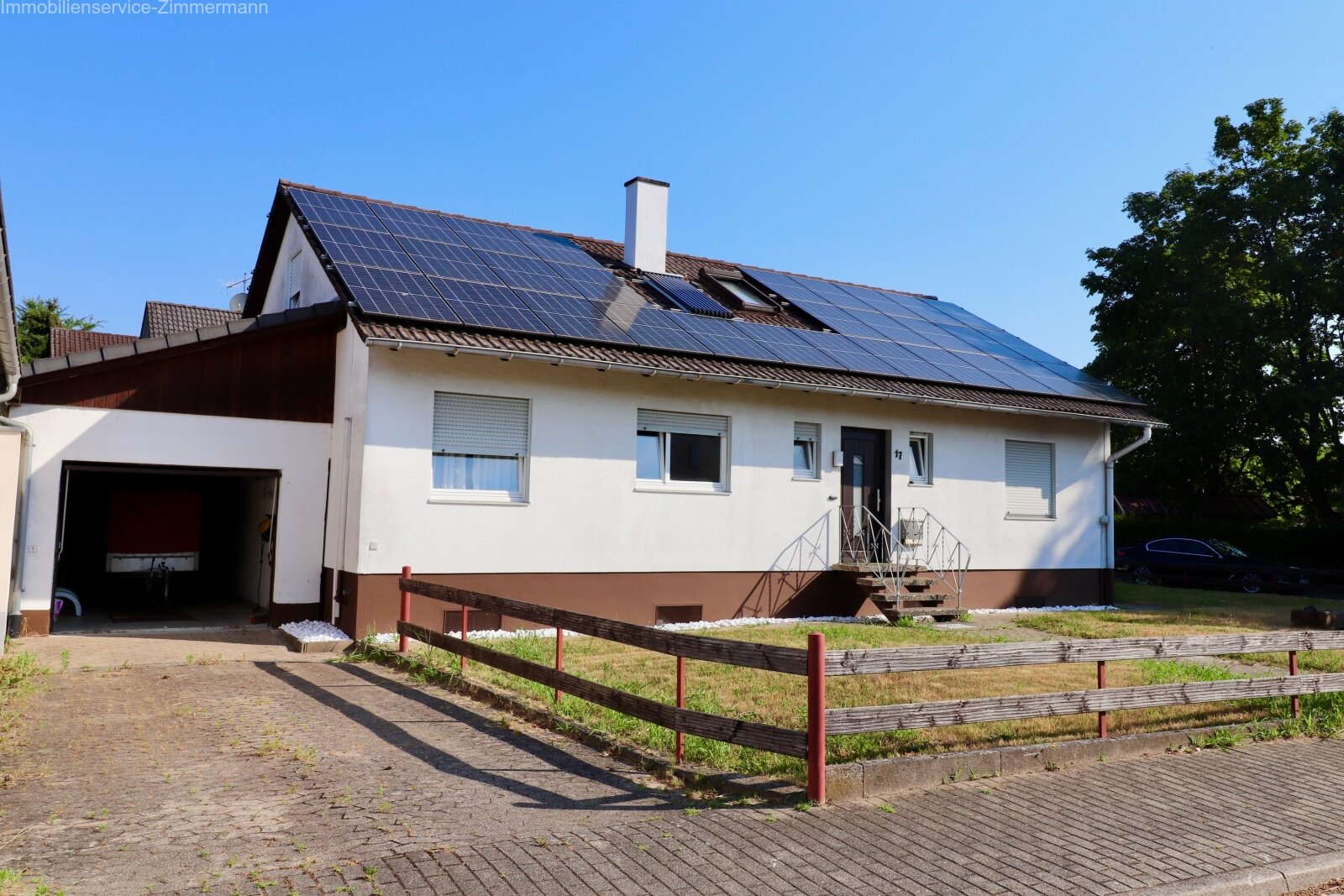 Einfamilienhaus mit  Garten und großer Garage in Rheinau zu verkaufen  